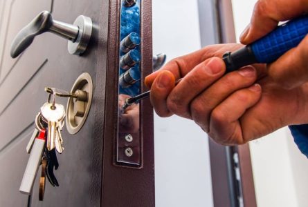locksmith-repairing-door-lock.jpeg
