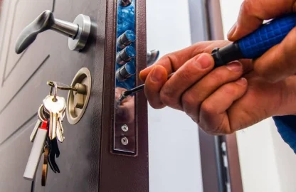 locksmith-repairing-door-lock.jpeg